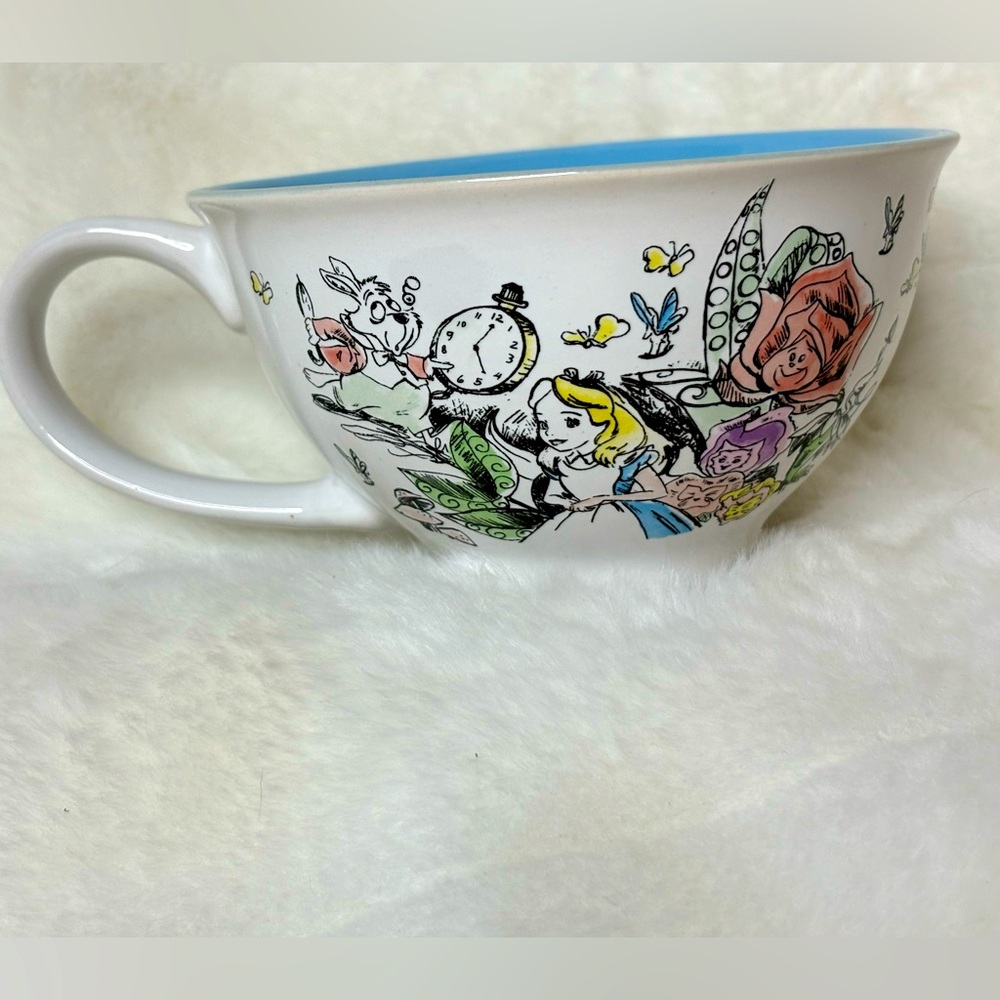 Disney Alice In Wonderland Tea cup, porcelain blue interior, only displayed